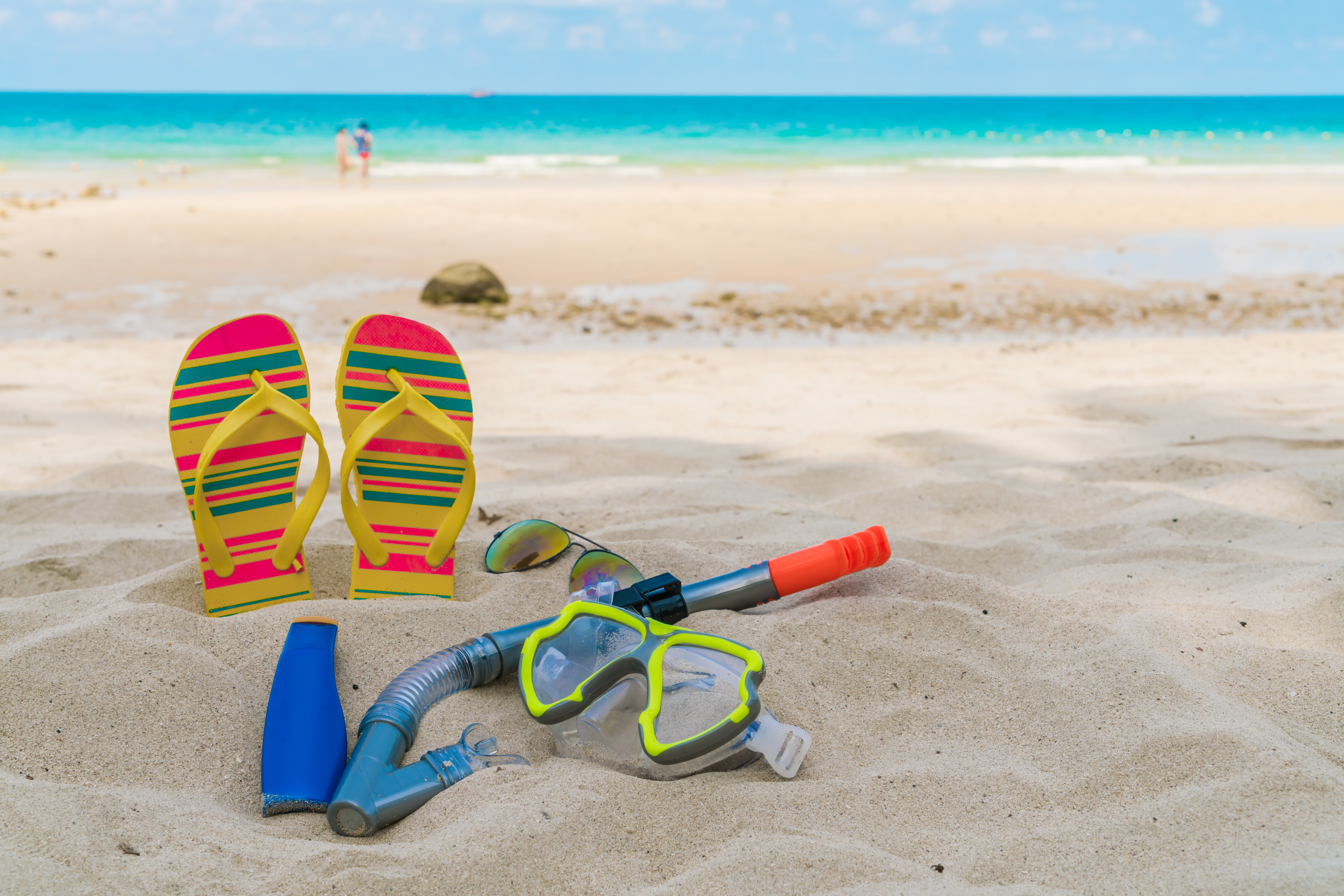 Scuba Diving Equipment On The White Sea Sand Beach